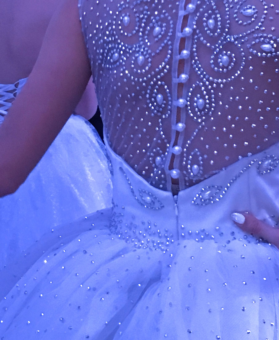 Detail-of-sequin-work-on-elegant-white-gown
