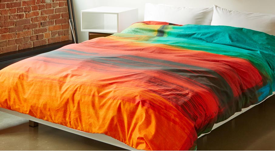 ZayZay-Living-African-Sunset-duvet-cover-displayed-in-room-on-bed